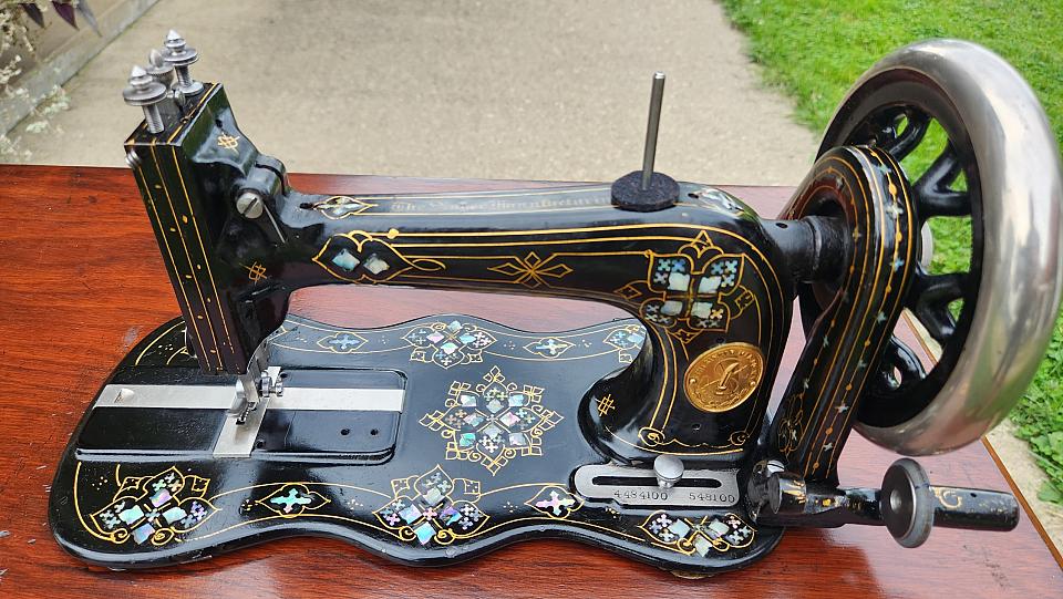 Singer New Family Sewing Machine adorned with Mother of Pearl