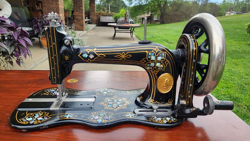 Singer New Family Sewing Machine adorned with Mother of Pearl