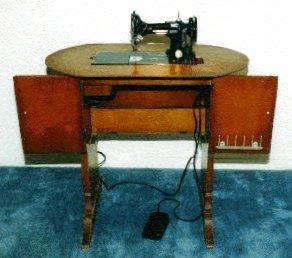 Singer's Number 68 Featherweight Sewing Machine Cabinet