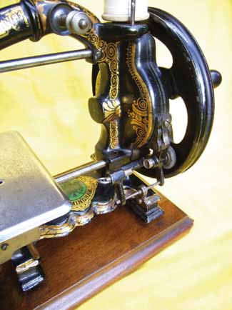 Illston's patent bobbin winder and larger balance wheel.