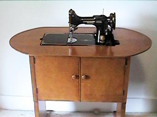 Singer's Number 68 Featherweight Sewing Machine Cabinet