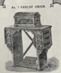 Union sewing table, No. 7 Parlor Union: six drawers (left and right), enclosed cabinet sides, ornamented trim; dropleaf and bonnet.