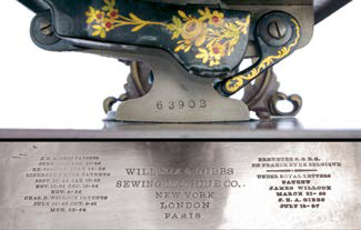 An early W&G hand machine with glass tension discs and an elaborate gantry to support the hand wheel.